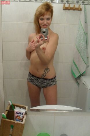 Fledgling teenager Electra Angel takes a picture of her bod