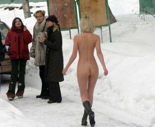Luscious blonde posing nude outdoor in the public place,..