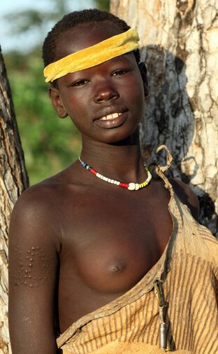 Bare tribe women, dark-hued african chicks sans brassiere